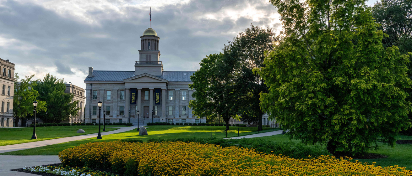 Summer flowers pictured in front of Old Capitol.